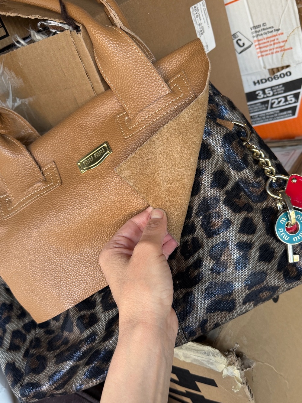 Genuine leather Leopard Print Tote with Tan Leather Trim and designer accents